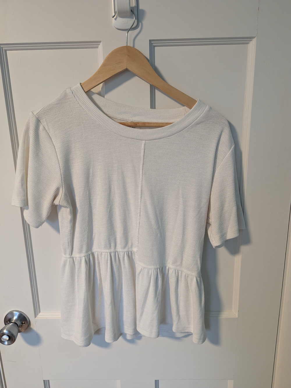 Roolee Asymmetrical Cream Ribbed Peplum Short Sleeve Top
